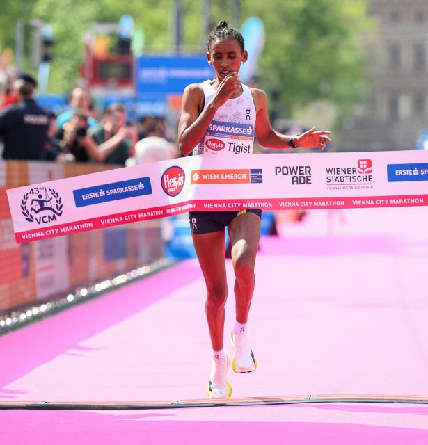 Ethiopia's Tigist Gezahagn crosses the finish line to win the women's race of the Vienna City Marathon (VCM) in Vienna, Austria, on April 19, 2026. (Photo by MAX SLOVENCIK / APA / AFP) / Austria OUT