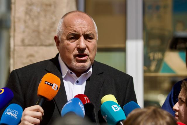 Leader of the GERB party and former Prime minister Boyko Borisov addresses media after casting his ballot at a polling station during Bulgaria's parliamentary elections in Sofia on April 19, 2026. Bulgarians vote in the country's eighth election in five years today, with ex-president Rumen Radev's grouping tipped to win on a pledge to fight corruption, after an anti-graft movement triggered a long political crisis. (Photo by DIMITAR KYOSEMARLIEV / AFP)