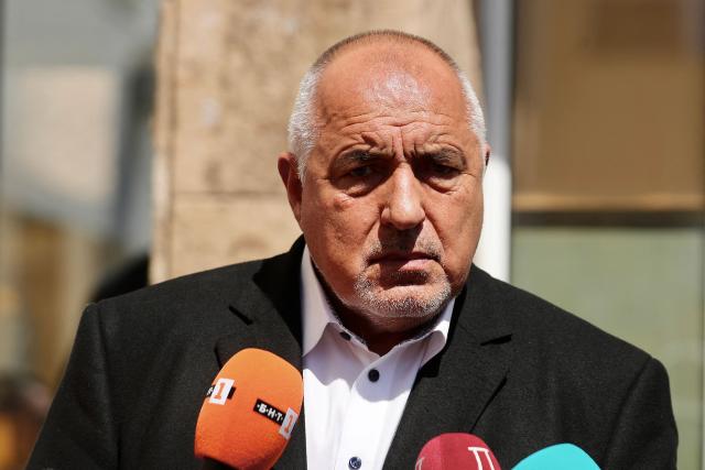 Leader of the GERB party and former Prime minister Boyko Borisov looks on as he addresses media after casting his ballot at a polling station during Bulgaria's parliamentary elections in Sofia on April 19, 2026. Bulgarians vote in the country's eighth election in five years today, with ex-president Rumen Radev's grouping tipped to win on a pledge to fight corruption, after an anti-graft movement triggered a long political crisis. (Photo by DIMITAR KYOSEMARLIEV / AFP)