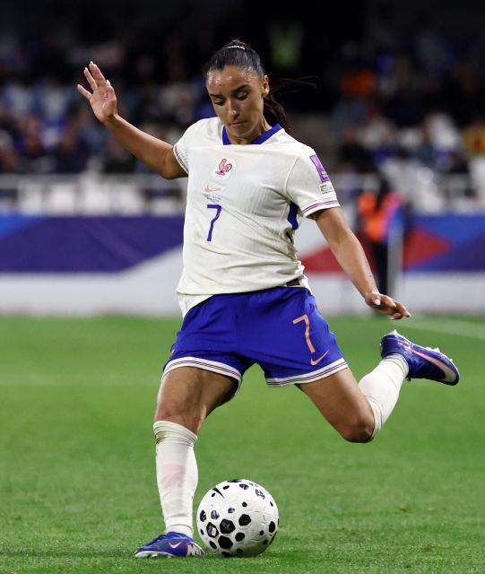 France's defender #7 Sakina Karchaoui kicks the ball during the women's FIFA world cup league A, group 2, qualifying football match between France and The Netherlands at the Stade de l'Abbe-Deschamps in Auxerre, central France on April 18, 2026. (Photo by FRANCK FIFE / AFP)