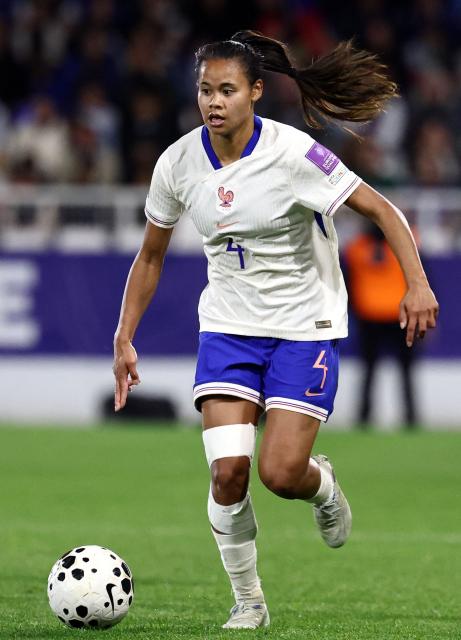 France's defender #28 Alice Sombath runs with the ball during the women's FIFA world cup league A, group 2, qualifying football match between France and The Netherlands at the Stade de l'Abbe-Deschamps in Auxerre, central France on April 18, 2026. (Photo by FRANCK FIFE / AFP)