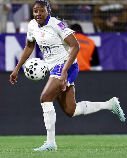 France's midfielder #11 Kadidatou Diani eyes the ball during the women's FIFA world cup league A, group 2, qualifying football match between France and The Netherlands at the Stade de l'Abbe-Deschamps in Auxerre, central France on April 18, 2026. (Photo by FRANCK FIFE / AFP)