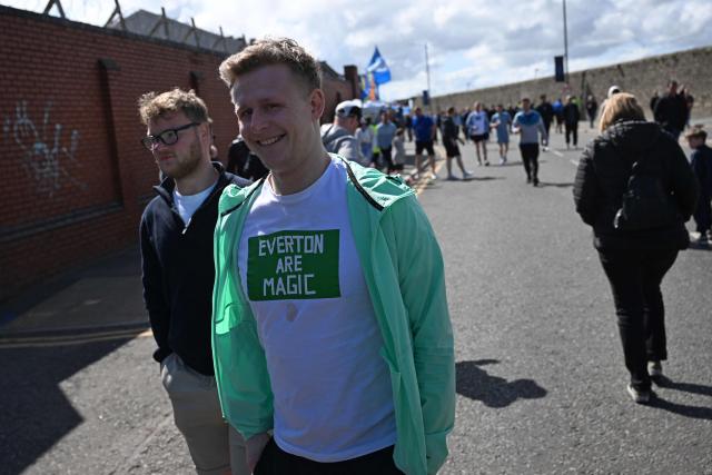 Fans arrive for the English Premier League football match between Everton and Liverpool at Hill Dickinson Stadium in Liverpool, north west England on April 19, 2026. (Photo by Paul ELLIS / AFP)