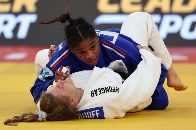 Germany's Julie Hoelterhoff (white) and France's Kaila Issoufi compete in the women's under 78 kg category bronze medal bout at the Judo European Senior Championships 2026 in Tbilisi on April 19, 2026. (Photo by Giorgi ARJEVANIDZE / AFP)