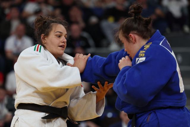Italy's Asya Tavano (white) and Estonia's Emma-Melis Aktas compete in the women's over 78 kg category bronze medal bout at the Judo European Senior Championships 2026 in Tbilisi on April 19, 2026. (Photo by Giorgi ARJEVANIDZE / AFP)