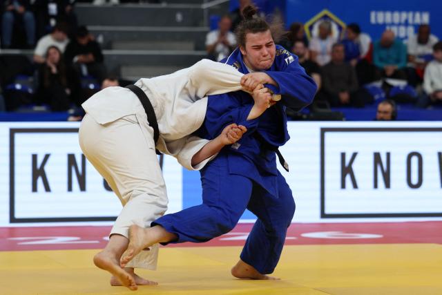 Italy's Asya Tavano (white) and Estonia's Emma-Melis Aktas compete in the women's over 78 kg category bronze medal bout at the Judo European Senior Championships 2026 in Tbilisi on April 19, 2026. (Photo by Giorgi ARJEVANIDZE / AFP)