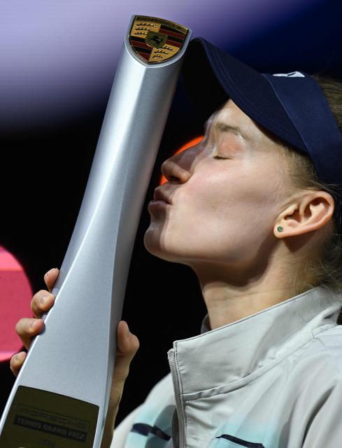 Kazakhstan’s Elena Rybakina kisses the trophy after winning against Czech Republic’s Karolina Muchova (not in picture) in the final match at the Women's Tennis Grand Prix WTA tournament in Stuttgart, southwestern Germany, on April 19, 2026. (Photo by THOMAS KIENZLE / AFP)