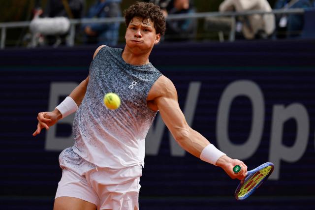 US' Ben Shelton returns the ball to Italy's Flavio Cobolli (not in picture) during the men's singles final match at the ATP Munich Open tennis tournament in Munich, southern Germany on April 19, 2026. (Photo by Alexandra BEIER / AFP)