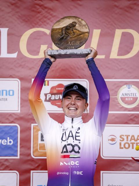 UAE Team ADQ's Spanish rider Paula Blasi celebrates on the podium after winning the women's 2026 Amstel Gold Race in Valkenburg on April 19, 2026. (Photo by Marcel VAN HOORN / ANP / AFP) / Netherlands OUT
