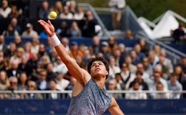 US' Ben Shelton serves the ball to Italy's Flavio Cobolli (not in picture) during the men's singles final match at the ATP Munich Open tennis tournament in Munich, southern Germany on April 19, 2026. (Photo by Alexandra BEIER / AFP)