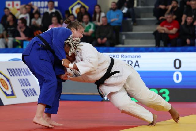 France's Romane Dicko (white) and Croatia's Helena Vukovic compete in the women's over 78 kg category bronze medal bout at the Judo European Senior Championships 2026 in Tbilisi on April 19, 2026. (Photo by Giorgi ARJEVANIDZE / AFP)