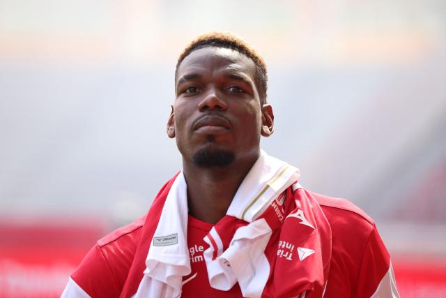 Monaco's French midfielder #08 Paul Pogba looks on during the warm-up ahead of the French L1 football match between AS Monaco and AJ Auxerre at the Stade Louis II in the Principality of Monaco on April 19, 2026. (Photo by Valery HACHE / AFP)