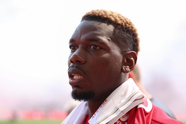 Monaco's French midfielder #08 Paul Pogba reacts during the warm-up ahead of the French L1 football match between AS Monaco and AJ Auxerre at the Stade Louis II in the Principality of Monaco on April 19, 2026. (Photo by Valery HACHE / AFP)