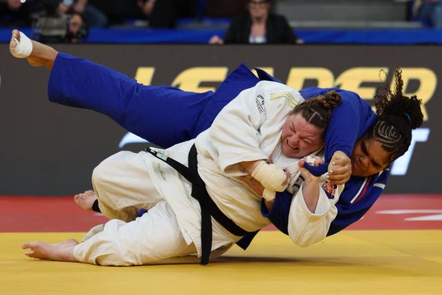 Israel's Raz Hershko (white) and France's Lea Fontaine compete in the women's over 78 kg category gold medal bout at the Judo European Senior Championships 2026 in Tbilisi on April 19, 2026. (Photo by Giorgi ARJEVANIDZE / AFP)