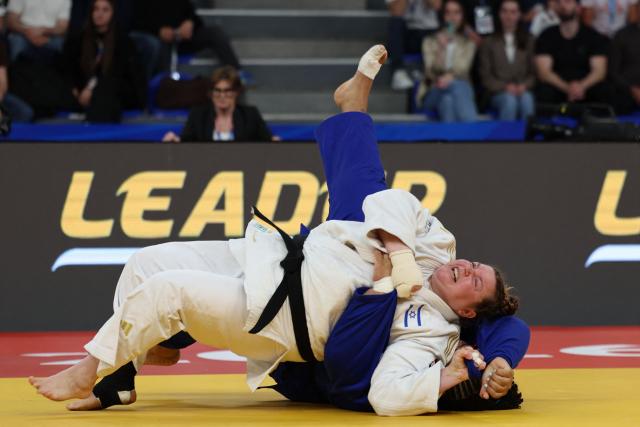 Israel's Raz Hershko (white) and France's Lea Fontaine compete in the women's over 78 kg category gold medal bout at the Judo European Senior Championships 2026 in Tbilisi on April 19, 2026. (Photo by Giorgi ARJEVANIDZE / AFP)