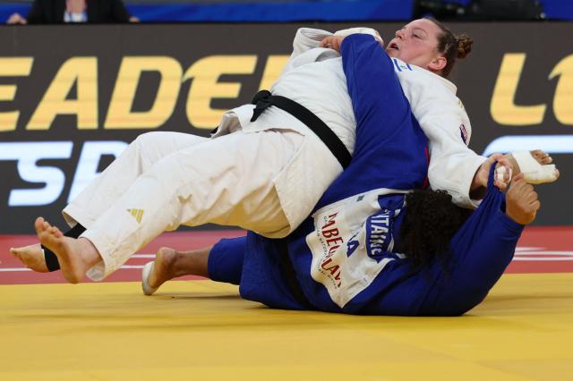 Israel's Raz Hershko (white) and France's Lea Fontaine compete in the women's over 78 kg category gold medal bout at the Judo European Senior Championships 2026 in Tbilisi on April 19, 2026. (Photo by Giorgi ARJEVANIDZE / AFP)