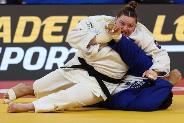 Israel's Raz Hershko (white) and France's Lea Fontaine compete in the women's over 78 kg category gold medal bout at the Judo European Senior Championships 2026 in Tbilisi on April 19, 2026. (Photo by Giorgi ARJEVANIDZE / AFP)