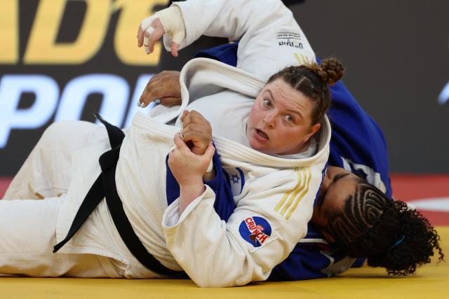 Israel's Raz Hershko (white) and France's Lea Fontaine compete in the women's over 78 kg category gold medal bout at the Judo European Senior Championships 2026 in Tbilisi on April 19, 2026. (Photo by Giorgi ARJEVANIDZE / AFP)