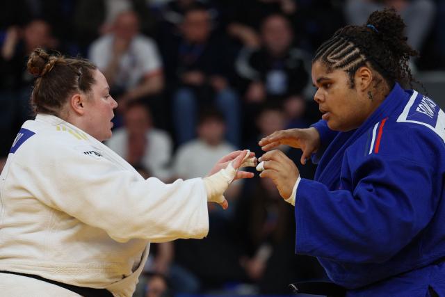 Israel's Raz Hershko (white) and France's Lea Fontaine compete in the women's over 78 kg category gold medal bout at the Judo European Senior Championships 2026 in Tbilisi on April 19, 2026. (Photo by Giorgi ARJEVANIDZE / AFP)