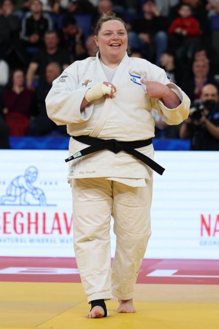 Israel's Raz Hershko (white) wins against France's Lea Fontaine in the women's over 78 kg category gold medal bout at the Judo European Senior Championships 2026 in Tbilisi on April 19, 2026. (Photo by Giorgi ARJEVANIDZE / AFP)