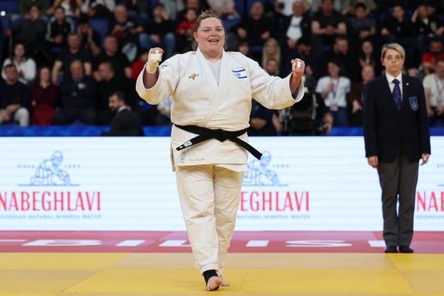 Israel's Raz Hershko (white) wins against France's Lea Fontaine in the women's over 78 kg category gold medal bout at the Judo European Senior Championships 2026 in Tbilisi on April 19, 2026. (Photo by Giorgi ARJEVANIDZE / AFP)