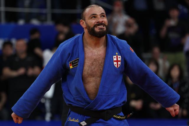 Georgia's Guram Tushishvili wins against Czech Republic's Lukas Krpalek in the men's over 100 kg category gold medal bout at the Judo European Senior Championships 2026 in Tbilisi on April 19, 2026. (Photo by Giorgi ARJEVANIDZE / AFP)