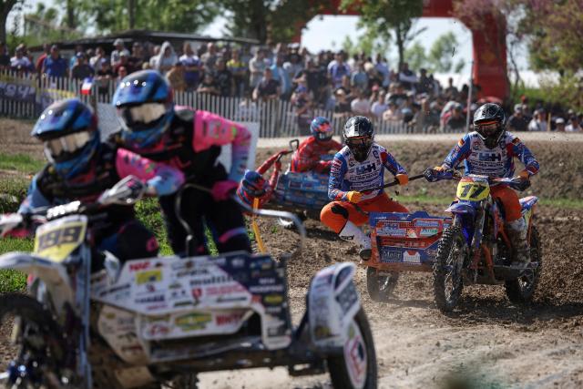 German biker Tim Prummer and Dutch biker Loet Van Der Putten (R) ride a sidecar motorcycle as they compete in the first of twelve rounds of the Fim Sidecarcross World Championship in Castelnau-de-Levis, south-western France on April 19, 2026. (Photo by Valentine CHAPUIS / AFP)
