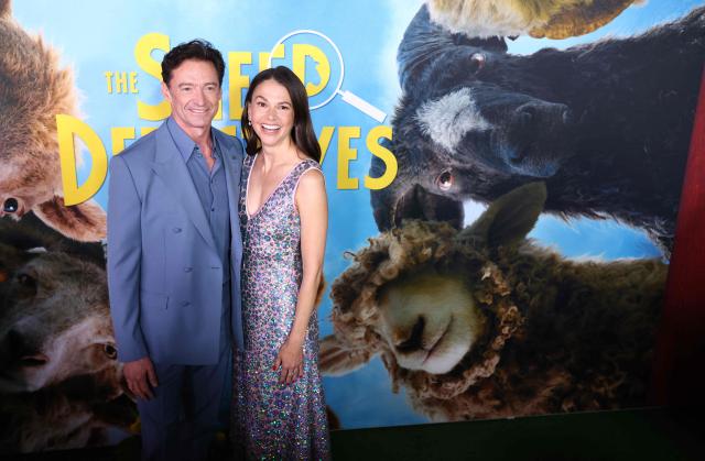 Australian actor Hugh Jackman and guest attend the premiere of "The Sheep Detectives" in New York on April 19, 2026. (Photo by CHARLY TRIBALLEAU / AFP)