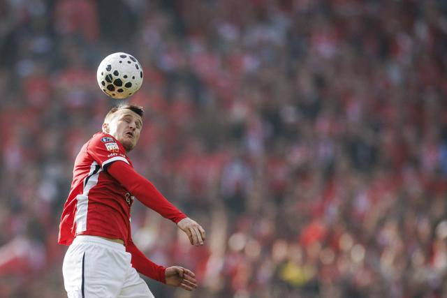 AZ's Dutch midfielder Peer Koopmeiners heads the ball during the KNVB Cup final match between AZ Alkmaar and NEC at De Kuip Stadium in Rotterdam, the Netherlands on April 19, 2026. (Photo by Robin van Lonkhuijsen / ANP / AFP) / Netherlands OUT