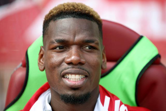 Monaco's French midfielder #08 Paul Pogba looks on ahead of the French L1 football match between AS Monaco and AJ Auxerre at the Stade Louis II in the Principality of Monaco on April 19, 2026. (Photo by Valery HACHE / AFP)