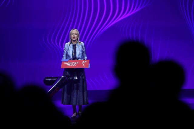 Accenture Chair and CEO Julie Sweet delivers her speech during the opening gala of the Hanover industrial trade fair for mechanical and electrical engineering and digital industries, in Hanover, northern Germany on April 19, 2026. The fair opens its doors to the public on April 20 and will be running until April 24, 2026. (Photo by Ronny HARTMANN / AFP)