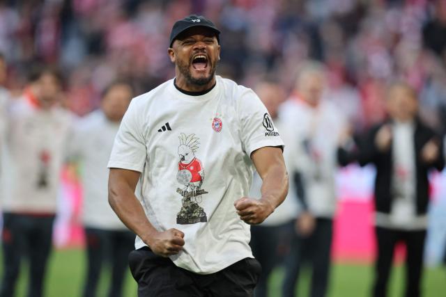 Bayern Munich's Belgian head coach Vincent Kompany celebrates after the German first division Bundesliga football match between FC Bayern Munich and VfB Stuttgart in Munich, southern Germany, on April 19, 2026. (Photo by Alexandra BEIER / AFP) / DFL REGULATIONS PROHIBIT ANY USE OF PHOTOGRAPHS AS IMAGE SEQUENCES AND/OR QUASI-VIDEO
