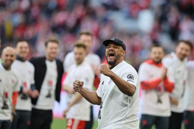 Bayern Munich's Belgian head coach Vincent Kompany celebrates after the German first division Bundesliga football match between FC Bayern Munich and VfB Stuttgart in Munich, southern Germany, on April 19, 2026. (Photo by Alexandra BEIER / AFP) / DFL REGULATIONS PROHIBIT ANY USE OF PHOTOGRAPHS AS IMAGE SEQUENCES AND/OR QUASI-VIDEO