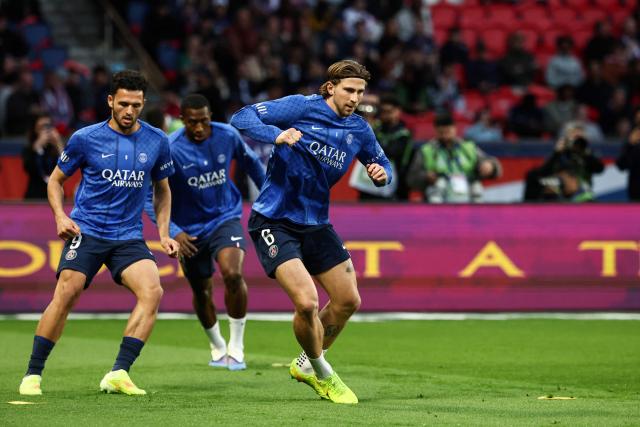 Paris Saint-Germain's Ukrainian defender #06 Illia Zabarnyi warms up prior to the French L1 football match between Paris Saint-Germain (PSG) and Olympique Lyonnais (OL) at the Parc des Princes stadium in Paris on April 19, 2026. (Photo by FRANCK FIFE / AFP)