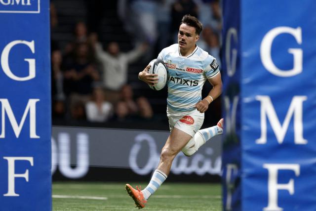 Racing 92' French full-back Max Spring runs with the ball during the French Top14 rugby union match between Racing 92 and Stade Francais at the Paris La Defense Arena in Nanterre, on the outskirts of Paris on April 19, 2026. (Photo by Kenzo TRIBOUILLARD / AFP)