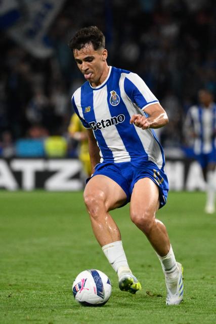 FC Porto's Spanish midfielder #10 Gabriel Veiga controls the ball during the Portuguese League football match between FC Porto and CD Tondela at Dragao stadium in Porto on April 19, 2026. (Photo by Miguel RIOPA / AFP)