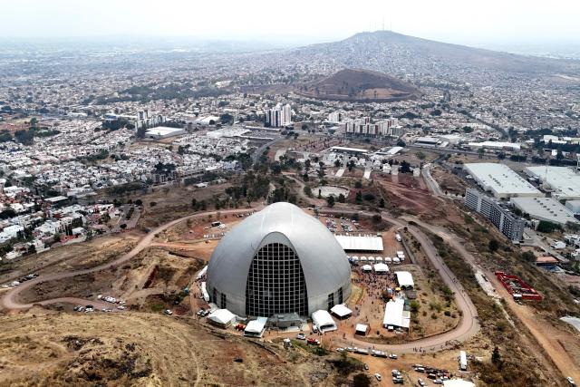 TOPSHOT - This aerial view shows the Sanctuary of the Mexican Martyrs, the venue of the 2026 Fearless Congress in Tlaquepaque, Jalisco state, Mexico on April 19, 2026. The Fearless Congress is hosted by conservative Catholics from Regnum Christi, a lay movement of the Legionaries of Christ, in response to the "attack on masculinity" that is growing in Mexico amid the rise of feminism, according to the event's organizers on their website. On April 16, 2026, feminist organizations protested against the event in front of the Ministry of the Interior, arguing that it spreads "hate speech" and highlighting the severe gender-based violence in Mexico. (Photo by Ulises RUIZ / AFP)