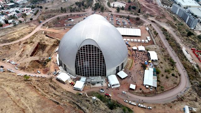 This aerial view shows the Sanctuary of the Mexican Martyrs, the venue of the 2026 Fearless Congress in Tlaquepaque, Jalisco state, Mexico on April 19, 2026. The Fearless Congress is hosted by conservative Catholics from Regnum Christi, a lay movement of the Legionaries of Christ, in response to the "attack on masculinity" that is growing in Mexico amid the rise of feminism, according to the event's organizers on their website. On April 16, 2026, feminist organizations protested against the event in front of the Ministry of the Interior, arguing that it spreads "hate speech" and highlighting the severe gender-based violence in Mexico. (Photo by Ulises RUIZ / AFP)