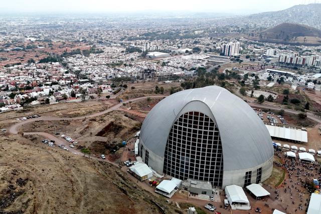 This aerial view shows the Sanctuary of the Mexican Martyrs, the venue of the 2026 Fearless Congress in Tlaquepaque, Jalisco state, Mexico on April 19, 2026. The Fearless Congress is hosted by conservative Catholics from Regnum Christi, a lay movement of the Legionaries of Christ, in response to the "attack on masculinity" that is growing in Mexico amid the rise of feminism, according to the event's organizers on their website. On April 16, 2026, feminist organizations protested against the event in front of the Ministry of the Interior, arguing that it spreads "hate speech" and highlighting the severe gender-based violence in Mexico. (Photo by Ulises RUIZ / AFP)