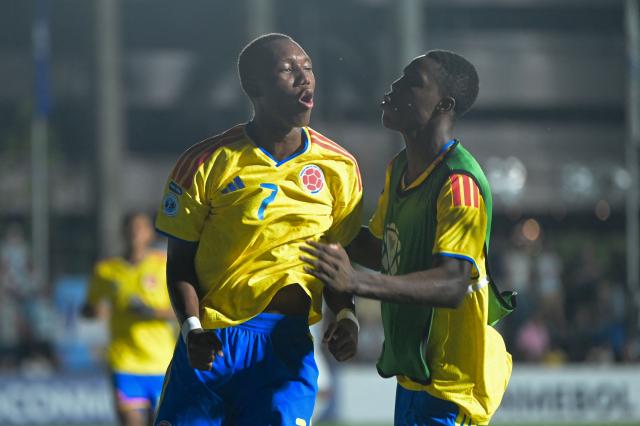 Colombia’s forward #7 Matias Caicedo celebrates after scoring the second goal during the South American U-17 championship final football match between Argentina and Colombia at the CARFEM Stadium in Ypane, Paraguay on April 19, 2026. (Photo by Daniel DUARTE / AFP)