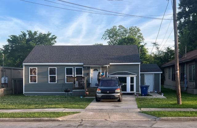 A woman is seen outside the house where a mass shooting took place in Shreveport, Louisiana, on April 19, 2026. Eight children were killed in a shooting spree early April 19 in the southern US state of Louisiana, in what police said appears to have been an incident of domestic violence. The incident, which took place just after 6:00 am (1100 GMT) in the city of Shreveport, was the deadliest mass shooting in the US in more than two years, according to data from the Gun Violence Archive. (Photo by Gianrigo MARLETTA / AFP)