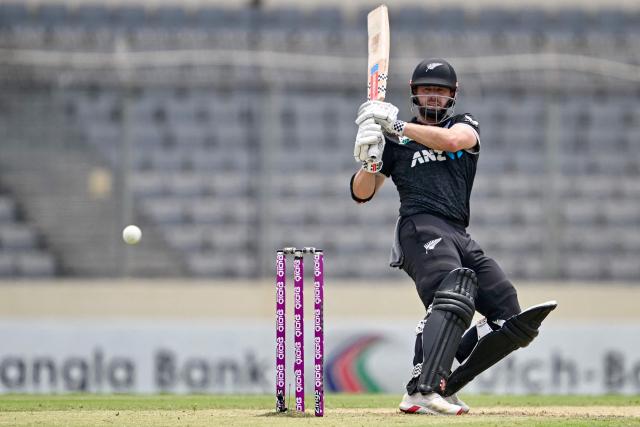 New Zealand’s Henry Nicholls plays a shot during the second one-day international (ODI) cricket match between Bangladesh and New Zealand at Sher-e-Bangla National Stadium in Mirpur on April 20, 2026. (Photo by Munir UZ ZAMAN / AFP)