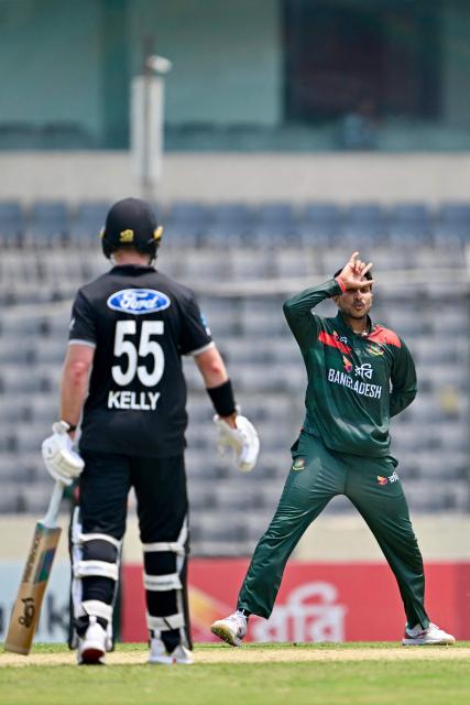 Bangladesh's Soumya Sarkar (R) celebrates after taking the wicket of New Zealand's captain Tom Latham as Nick Kelly watches during the second one-day international (ODI) cricket match between Bangladesh and New Zealand at Sher-e-Bangla National Stadium in Mirpur on April 20, 2026. (Photo by Munir UZ ZAMAN / AFP)