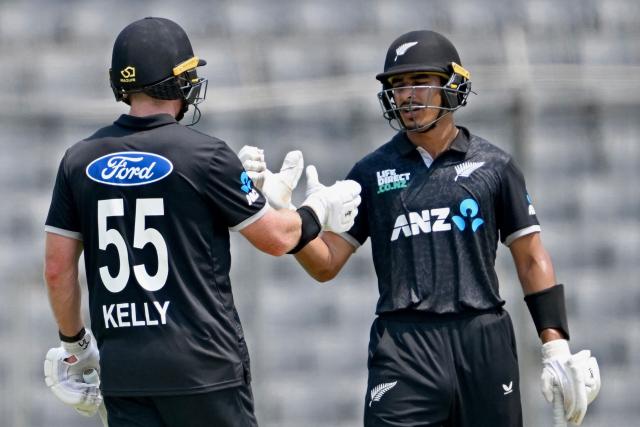 New Zealand Nick Kelly (L) celebrates with Muhammad Abbas after scoring a half-century (50 runs) during the second one-day international (ODI) cricket match between Bangladesh and New Zealand at Sher-e-Bangla National Stadium in Mirpur on April 20, 2026. (Photo by MUNIR UZ ZAMAN / AFP)