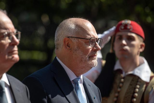 Estonia's President Alar Karis (R) and Greece's President Konstantinos Tasoulas (L) review the Presidential Guard outside the Presidential Palace prior to their meeting in Athens, on April 20, 2026. (Photo by Angelos TZORTZINIS / AFP)