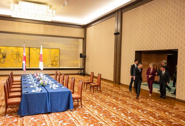 Britain's Foreign Secretary Yvette Cooper (2nd R) meets with Japan's Foreign Minister Toshimitsu Motegi (R) at the Iikura Guest House in Tokyo on April 20, 2026. (Photo by ANDREW CABALLERO-REYNOLDS / AFP)