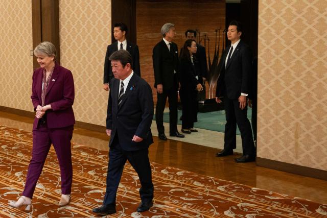 Britain's Foreign Secretary Yvette Cooper (L) meets with Japan's Foreign Minister Toshimitsu Motegi at the Iikura Guest House in Tokyo on April 20, 2026. (Photo by ANDREW CABALLERO-REYNOLDS / AFP)