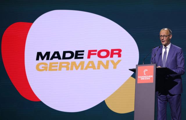 German Chancellor Friedrich Merz gives a speech during the opening of the Hannover Messe industrial trade fair for mechanical and electrical engineering and digital industries, in Hanover, northern Germany on April 20, 2026. The fair will be running until April 24, 2026. (Photo by Ronny HARTMANN / AFP)