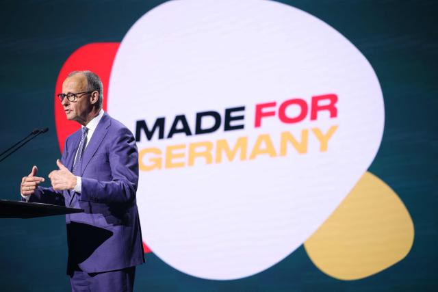 German Chancellor Friedrich Merz gives a speech during the opening of the Hannover Messe industrial trade fair for mechanical and electrical engineering and digital industries, in Hanover, northern Germany on April 20, 2026. The fair will be running until April 24, 2026. (Photo by Ronny HARTMANN / AFP)