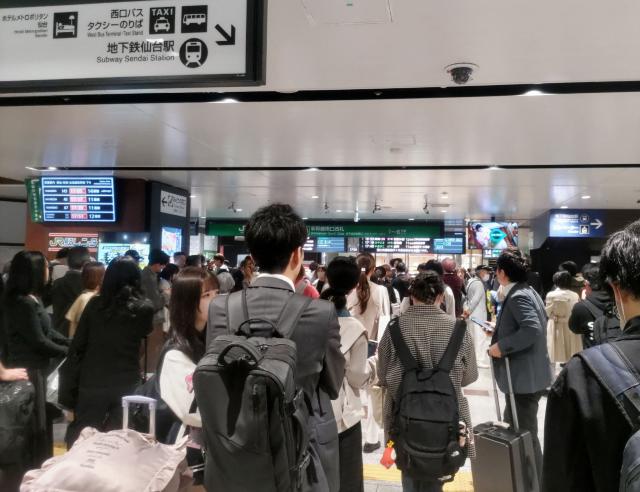 This photo shows a general view of a crowded railway station as the Shinkansen services are suspended after an earthquake hit northern Japan, in Sendai city of Miyagi Prefecture on April 20, 2026. A 7.4-magnitude earthquake struck northern Japan on April 20, Japan's Meteorological Agency (JMA) said, issuing a tsunami warning for waves up to three metres (10 feet). (Photo by JIJI Press / AFP) / Japan OUT
